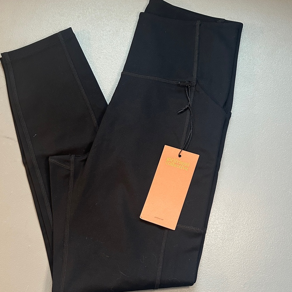 Girlfriend Collective Compressive High-Rise Pocket Legging in black.